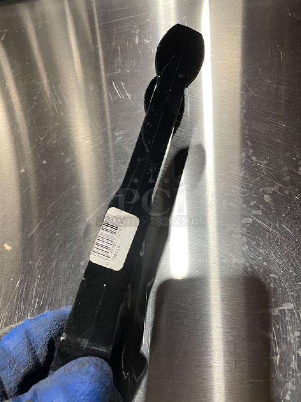NEW Cambro Lugano Series black 9" flat grip tongs, Model TG9110, in pristine condition, barcode sticker visible.