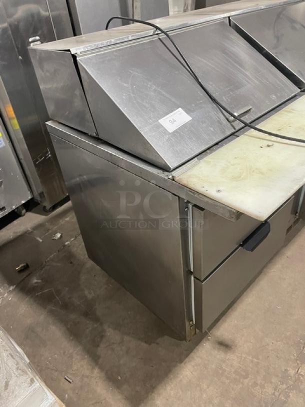 Beverage-Air Stainless Steel 4 Drawer Refrigerated Prep Table, Model SPED60-24M-4, with cutting board, on casters.