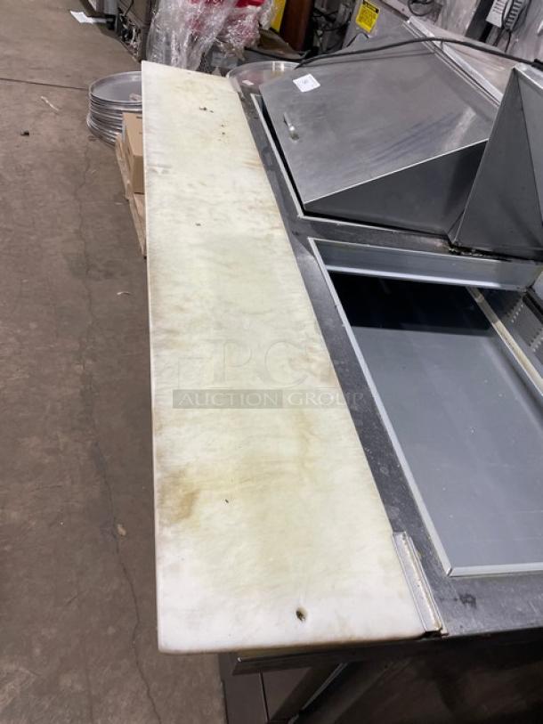 Beverage-Air SPED60-24M-4 refrigerated prep table with cutting board, stainless steel, 4 drawers, on casters, 115V 1 phase.