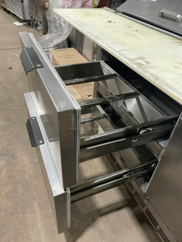 Beverage-Air stainless steel 4-drawer refrigerated prep table with cutting board, model SPED60-24M-4, on casters.