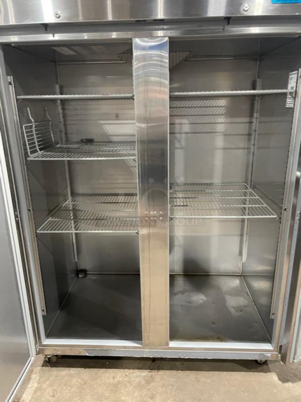 Hoshizaki R2AFS stainless steel 2-door reach-in refrigerator with poly coated wire racks, on casters, model SN: J50711C.