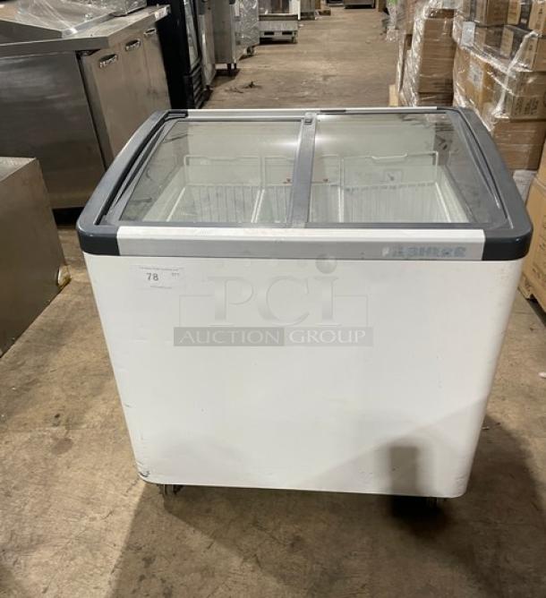 Liebherr EFI2053 commercial white curved glass ice cream freezer, double sliding top, poly-coated wire baskets, on casters.