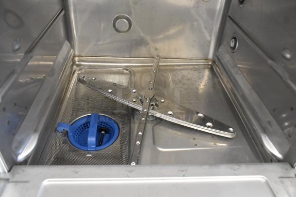 Hobart LXNH stainless steel undercounter dishwasher interior, showing spray arms and filter. Brand new, scratch and dent.
