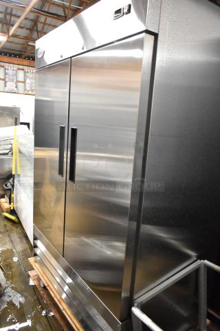 BRAND NEW SCRATCH AND DENT! 2025 KoolMore RIR-2D-SS Stainless Steel Commercial 2 Door Reach in Cooler w/ Poly Coated Racks. 115 Volts, 1 Phase.