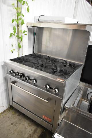Kona NJR-6-36 Stainless Steel Commercial Natural Gas Powered 6 Burner Range w/ Oven, Over Shelf and Back Splash on Commercial Casters.