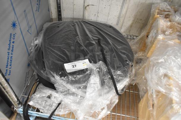 Set of 4 new Lancaster Table & Seating peppery black chair cushions with ties in packaging. Scratch and dent condition.