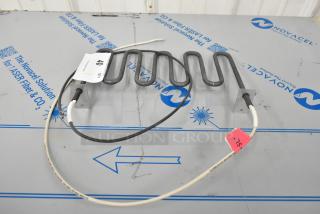 BRAND NEW SCRATCH AND DENT electric burner, coiled design, with attached wires on Novacel packaging. Tags indicate condition.