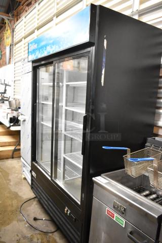 BRAND NEW SCRATCH AND DENT! 2022 Coldline G53S-B Metal Commercial 2 Door Reach In Cooler Merchandiser w/ Poly Coated Racks on Commercial Casters. 115 Volts, 1 Phase. - Item #1193768