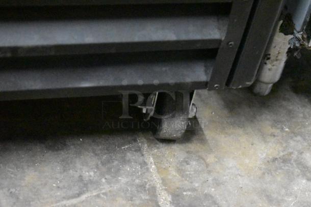 BRAND NEW SCRATCH AND DENT! 2022 Coldline G53S-B Metal Commercial 2 Door Reach In Cooler Merchandiser w/ Poly Coated Racks on Commercial Casters. 115 Volts, 1 Phase. - Image 5 of 9