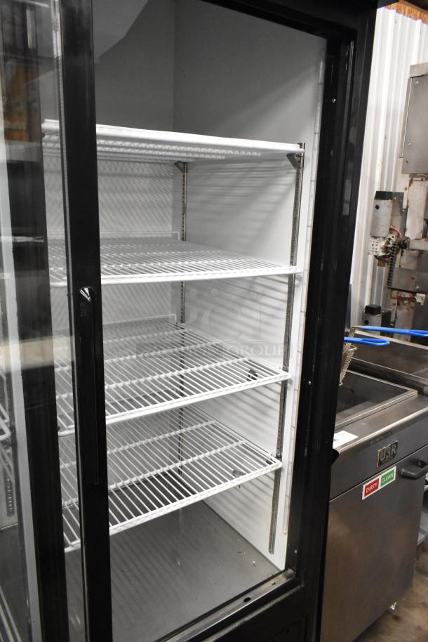 BRAND NEW SCRATCH AND DENT! 2022 Coldline G53S-B Metal Commercial 2 Door Reach In Cooler Merchandiser w/ Poly Coated Racks on Commercial Casters. 115 Volts, 1 Phase. - Image 6 of 9