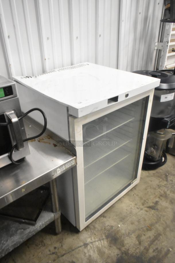 SG Merchandising MDH05-SSGD metal mini cooler merchandiser, 115 volts, 1 phase. Visible wear on exterior.