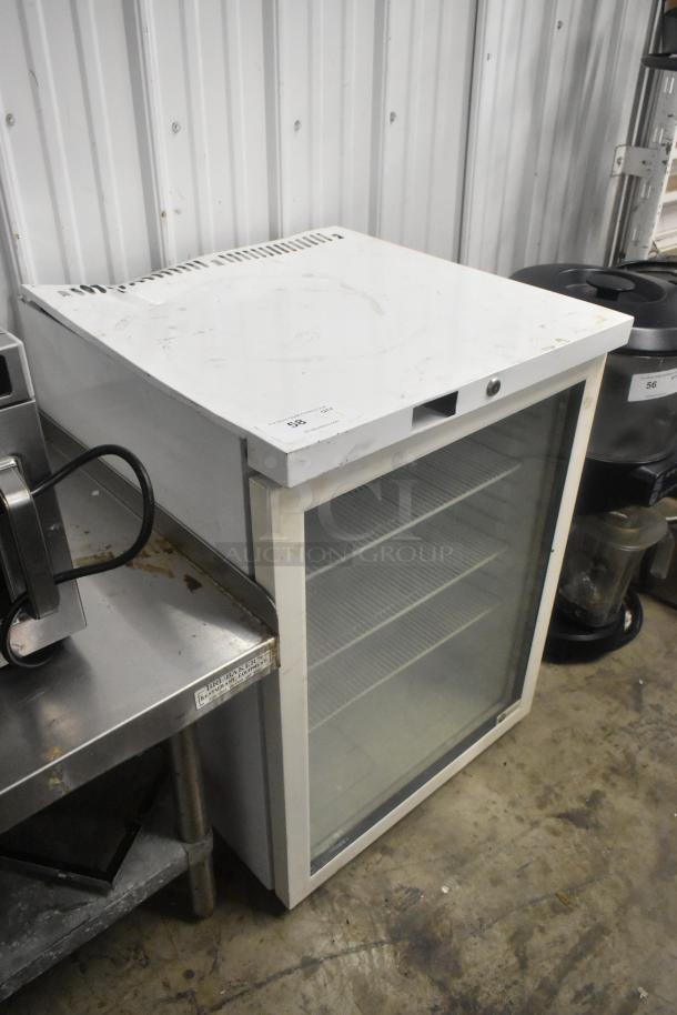 SG Merchandising MDH05-SSGD metal mini cooler merchandiser, 115 volts, 1 phase, with glass front, moderate wear.