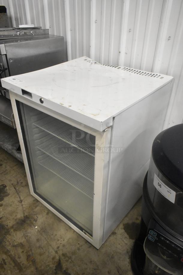 SG Merchandising MDH05-SSGD mini cooler, metal body, visible wear, 115 volts, 1 phase, glass door, three shelves.