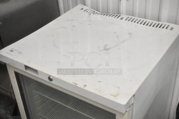 SG Merchandising MDH05-SSGD metal mini cooler merchandiser, 115V, used condition, visible scuffs, glass door, interior shelves.