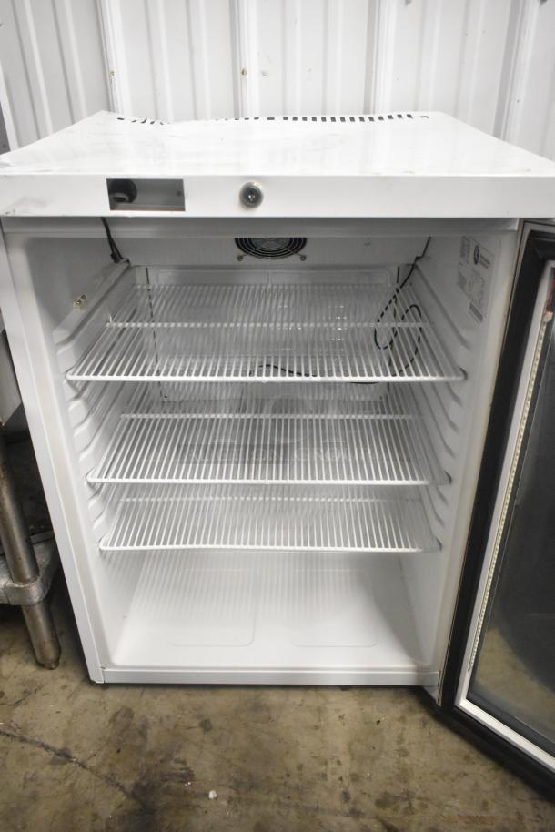 SG Merchandising MDH05-SSGD metal mini cooler merchandiser, 115V, 1 phase; features three wire shelves and a glass door.