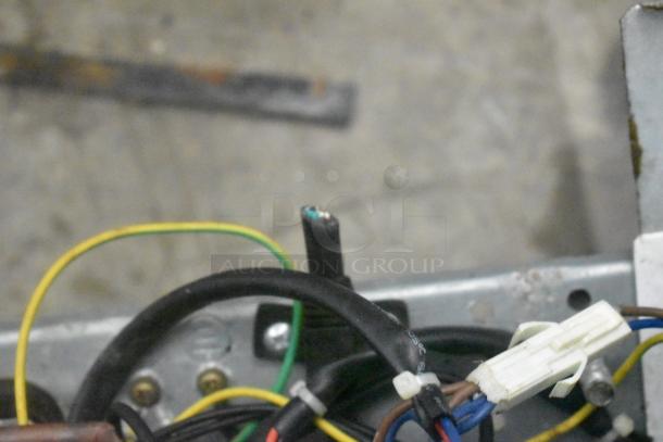 Untidy wiring and connectors from SG Merchandising MDH05-SSGD mini cooler. Needs repair. 115 volts, 1 phase.