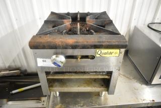 2021 Qualite QLSP-1NG stainless steel commercial countertop natural gas single burner range, visible wear, model QLSP-1NG tag.