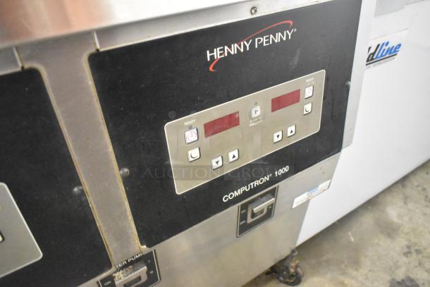 Henny Penny OFG-323 Stainless Steel Commercial Floor Style Natural Gas Powered 3 Bay Deep Fat Fryer w/ Filtration System on Commercial Casters. 255,000 BTU. - Image 6 of 14