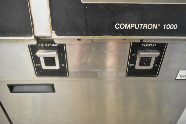 Henny Penny OFG-323 Stainless Steel Commercial Floor Style Natural Gas Powered 3 Bay Deep Fat Fryer w/ Filtration System on Commercial Casters. 255,000 BTU. - Image 7 of 14