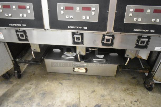Henny Penny OFG-323 Stainless Steel Commercial Floor Style Natural Gas Powered 3 Bay Deep Fat Fryer w/ Filtration System on Commercial Casters. 255,000 BTU. - Image 9 of 14