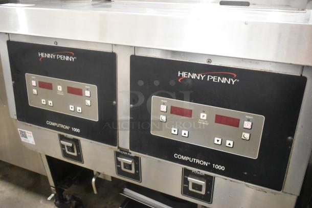 Henny Penny OFG-323 2 Bay Deep Fat Fryer, stainless steel, natural gas, 255,000 BTU, on commercial casters.