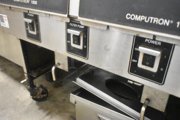 Henny Penny OFG-323 stainless steel 2-bay fryer with controls, on commercial casters. Natural gas, 255,000 BTU.