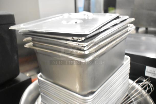 Lot of metal baking pans, stainless steel bins, and metal bowls. Stack of pans shown. Used condition.