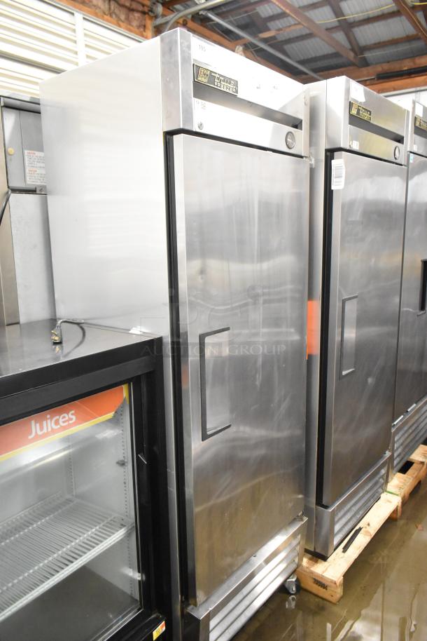 True T-19F stainless steel commercial single door freezer with poly coated racks and casters, 115V, 1 phase.