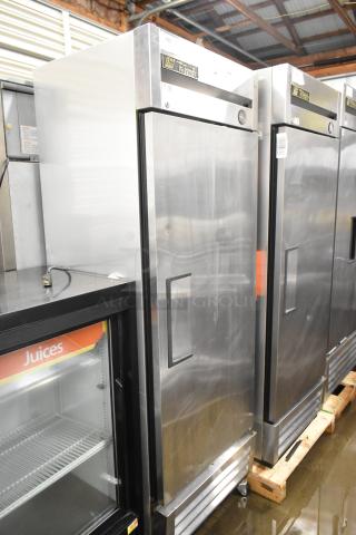 True T-19F Stainless Steel Commercial Single Door Reach In Freezer w/ Poly Coated Racks on Commercial Casters. 115 Volts, 1 Phase. Tested and Powers On But Does Not Get Cold - Item #1193935