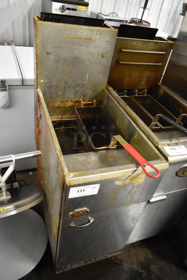 Pitco Frialator 40D stainless steel commercial fryer; natural gas, 115,000 BTU. Visible wear and rust on exterior. Auction tag 111.