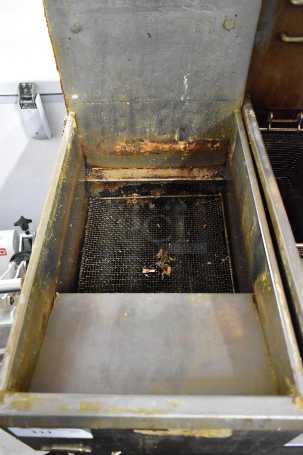 Pitco Frialator 40D deep fat fryer, stainless steel, natural gas, 115,000 BTU. Visible wear and grease buildup inside.