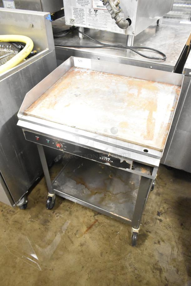 Mayfair PA10301A stainless steel electric flat top griddle with thermostatic controls and under shelf on casters, 240V, used condition.