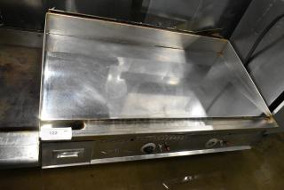 Keating MiraClean 48X30 stainless steel natural gas flat top griddle, 120,000 BTU, commercial use, excellent condition.