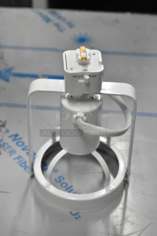 Box of new Contech Lighting CTL2830-P gimbal track luminaires, front relamping, line voltage, white finish, with on/off switch.