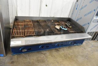 Blue Flame stainless steel commercial countertop gas charbroiler grill with visible rust and wear, model details on front panel.