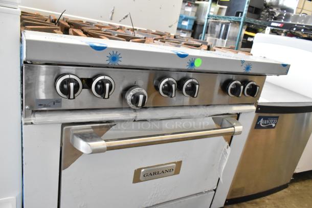 BRAND NEW SCRATCH AND DENT! 2025 Garland G36-6R Stainless Steel Commercial Natural Gas Powered 6 Burner 36" Range with Standard Oven - 236,000 BTU - Image 4 of 9