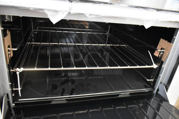 BRAND NEW SCRATCH AND DENT! 2025 Garland G36-6R Stainless Steel Commercial Natural Gas Powered 6 Burner 36" Range with Standard Oven - 236,000 BTU - Image 6 of 9
