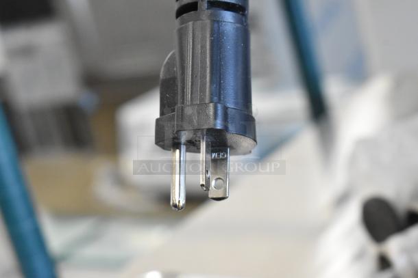 Close-up of a standard three-prong plug for the Waring WGR240X stainless steel countertop griddle, 240 volts.