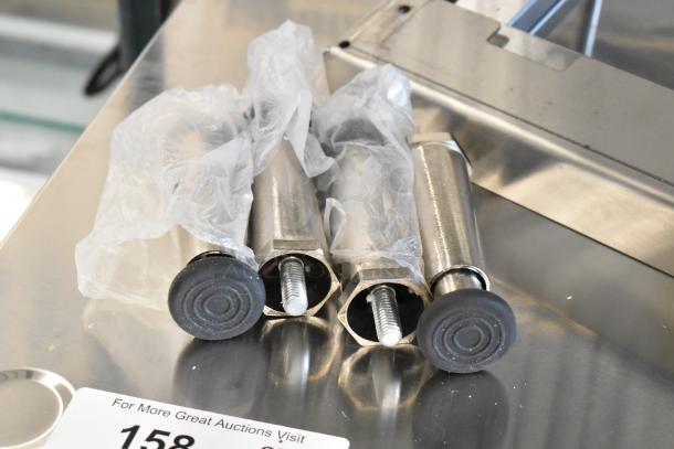Stainless steel legs with black rubber feet and plastic covering for the Avantco 177DDPO18SA oven.