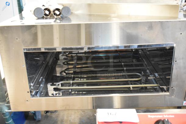Brand new Avantco 177DDPO18SA stainless steel 18" countertop pizza oven with digital controls, visible elements, 120V, 1 phase.