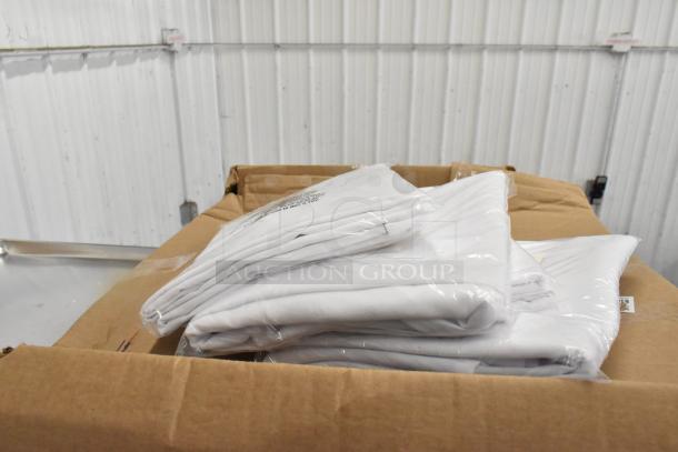 Box of 160 Choice 72" round white polyester table covers and black seat cushions, brand new with minor box damage.