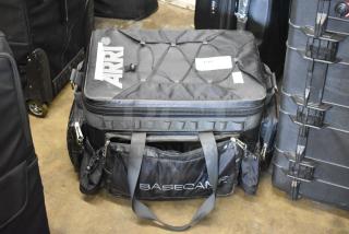 Basecamp case with "ARRI" logo, containing a Maui controller, sturdy design, side pockets, and top handles.