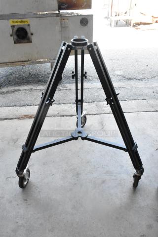 Kessler tripod on casters, sturdy black metal construction, good condition, includes labeled soft case.