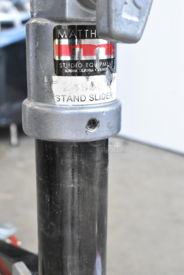 Matthew Tripod B339761 with stand slider, showing wear, labels by Matthews Studio Equipment, Burbank, CA.