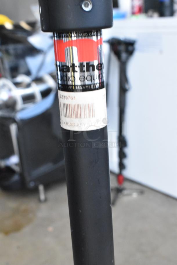 Matthew B339761 tripod, black, sturdy design, visible label with model number and barcode, slight wear; ideal for photography.