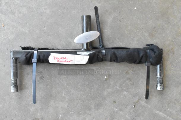 Lot of metal pieces including a Double Header. Black-wrapped metal bar with label marked "Double Header," in used condition.