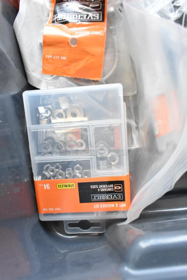 Lot of various items including Everbilt washer kit and lock nuts, 94-piece stainless set with assorted sizes, in plastic case.