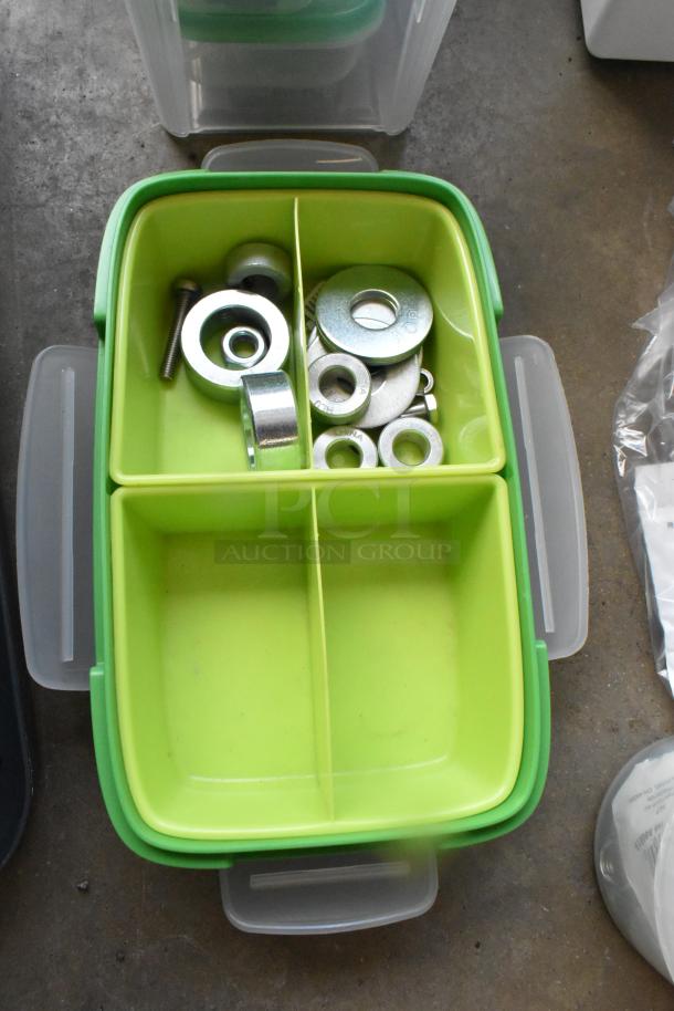 Green plastic storage tray with assorted washers and lock nuts in various sizes, ideal for hardware projects.
