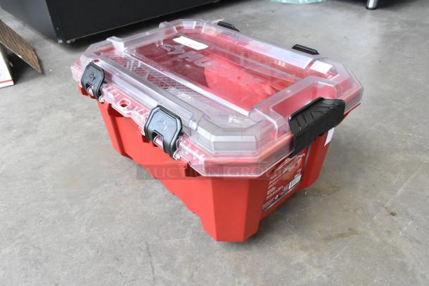 Husky 5-gallon professional storage container with contents, clear lid, secure latches, red base, excellent condition.