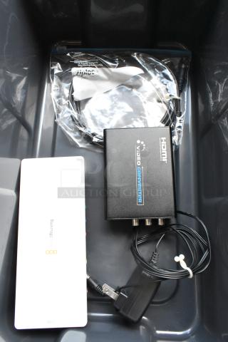 HDMI Video Converter in poly bin, includes power cable, Blackmagic component, new condition, Ziploc bag for accessories.